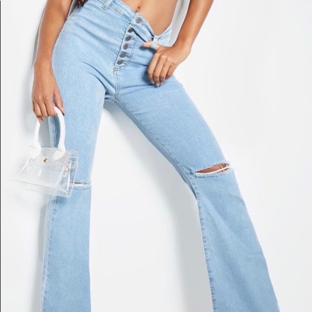 Light Washed Ripped Flared Jeans